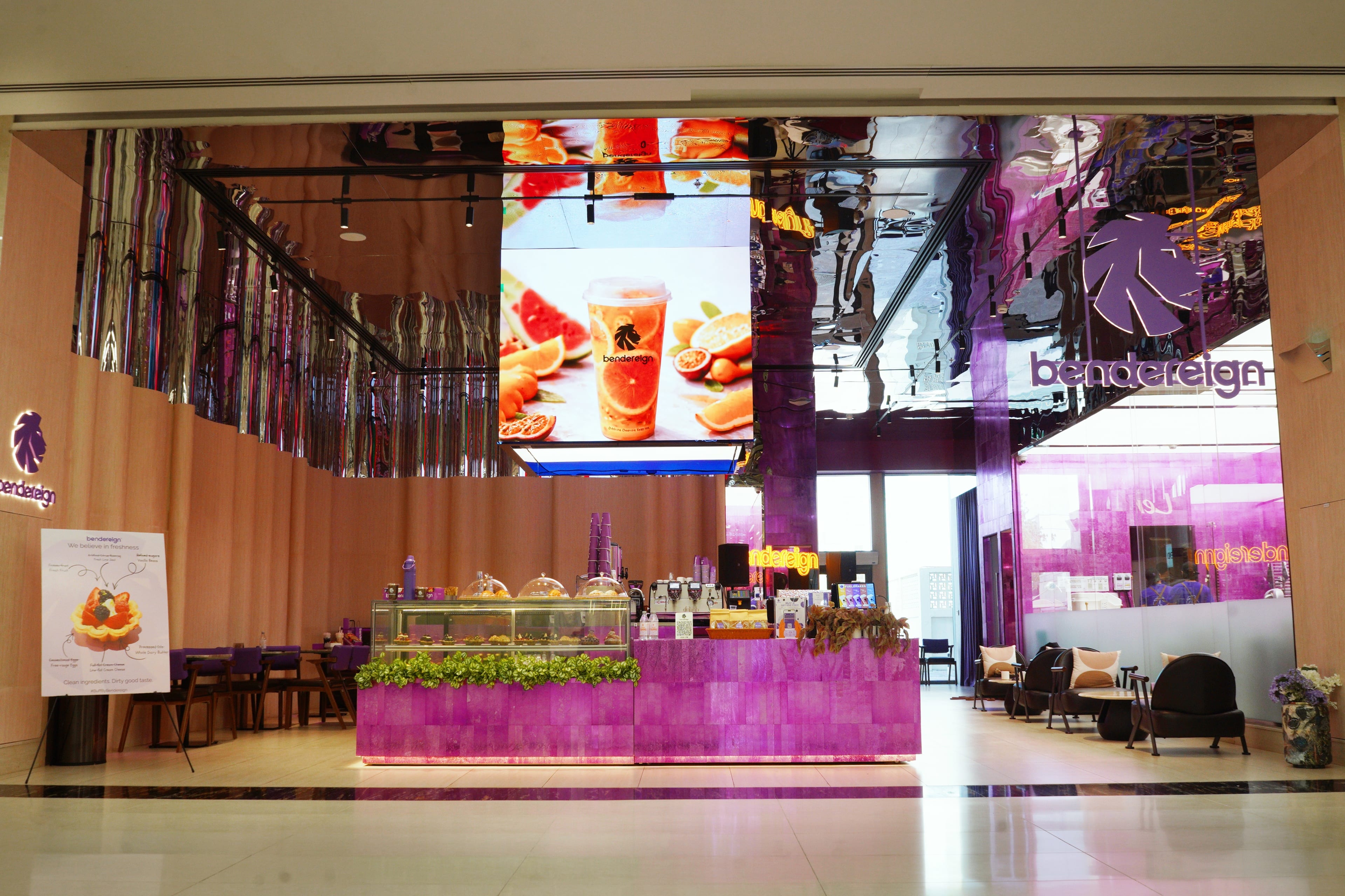 The Bendereign service counter and pastry case beneath the illuminated fascia.